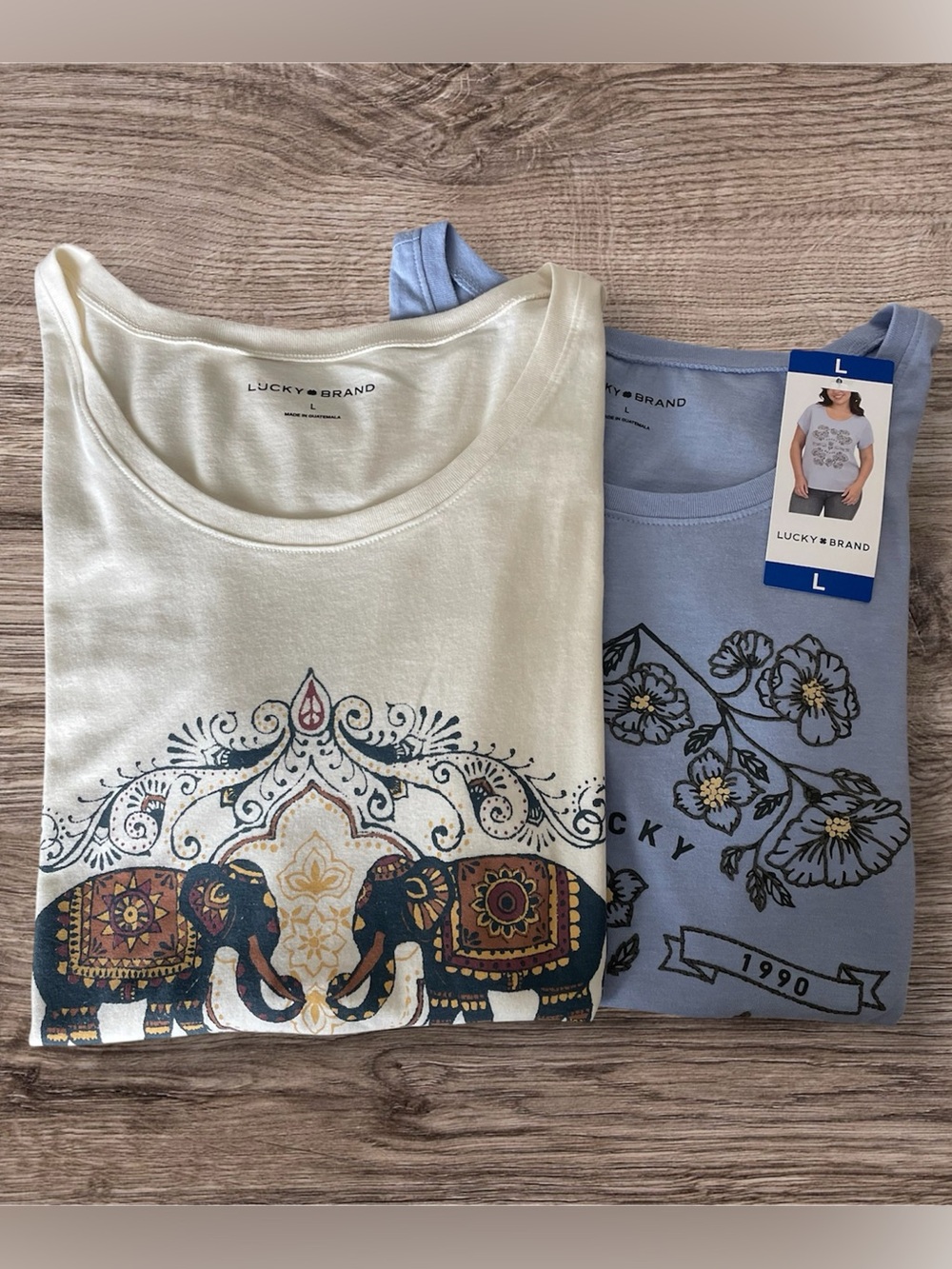 Two Lucky Brand Ivory & Blue Tees with Colorful Elephant Floral Graphics Size L